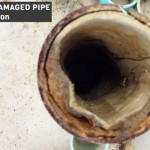 Old damaged pipes cut out by plumber